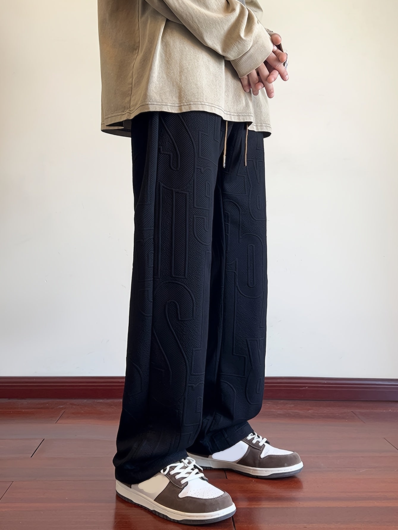 Pantalon droit d'automne pour homme, en tissu jacquard intégral, taille élastiquée avec cordon de serrage, idéal pour les activités décontractées de printemps et d'automne.