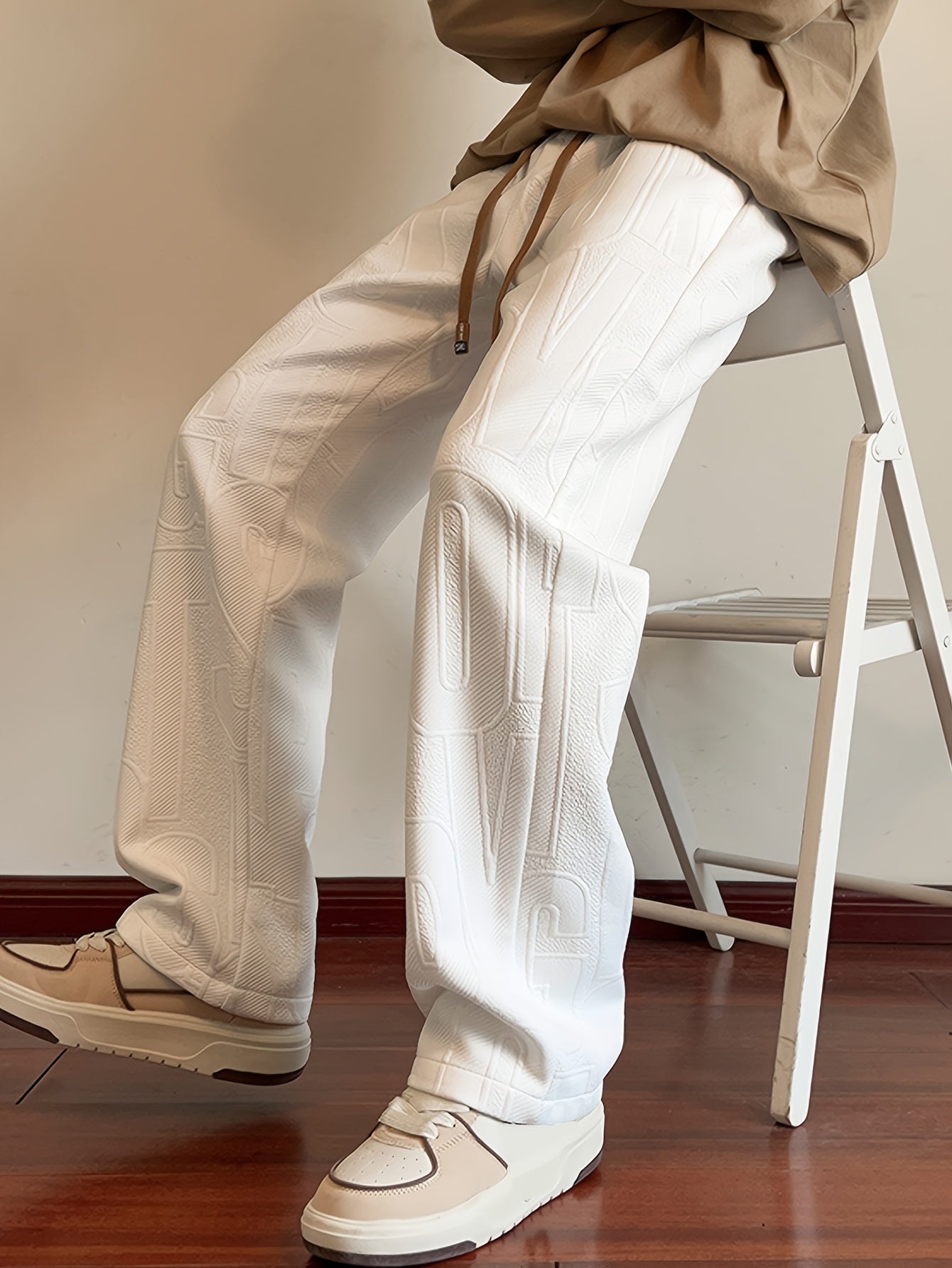 Pantalon droit d'automne pour homme, en tissu jacquard intégral, taille élastiquée avec cordon de serrage, idéal pour les activités décontractées de printemps et d'automne.