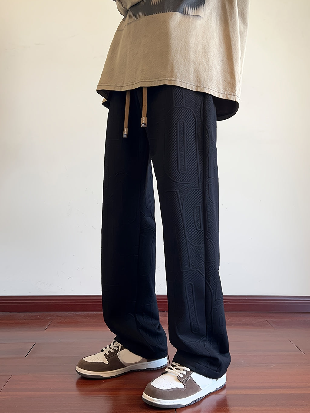 Pantalon droit d'automne pour homme, en tissu jacquard intégral, taille élastiquée avec cordon de serrage, idéal pour les activités décontractées de printemps et d'automne.