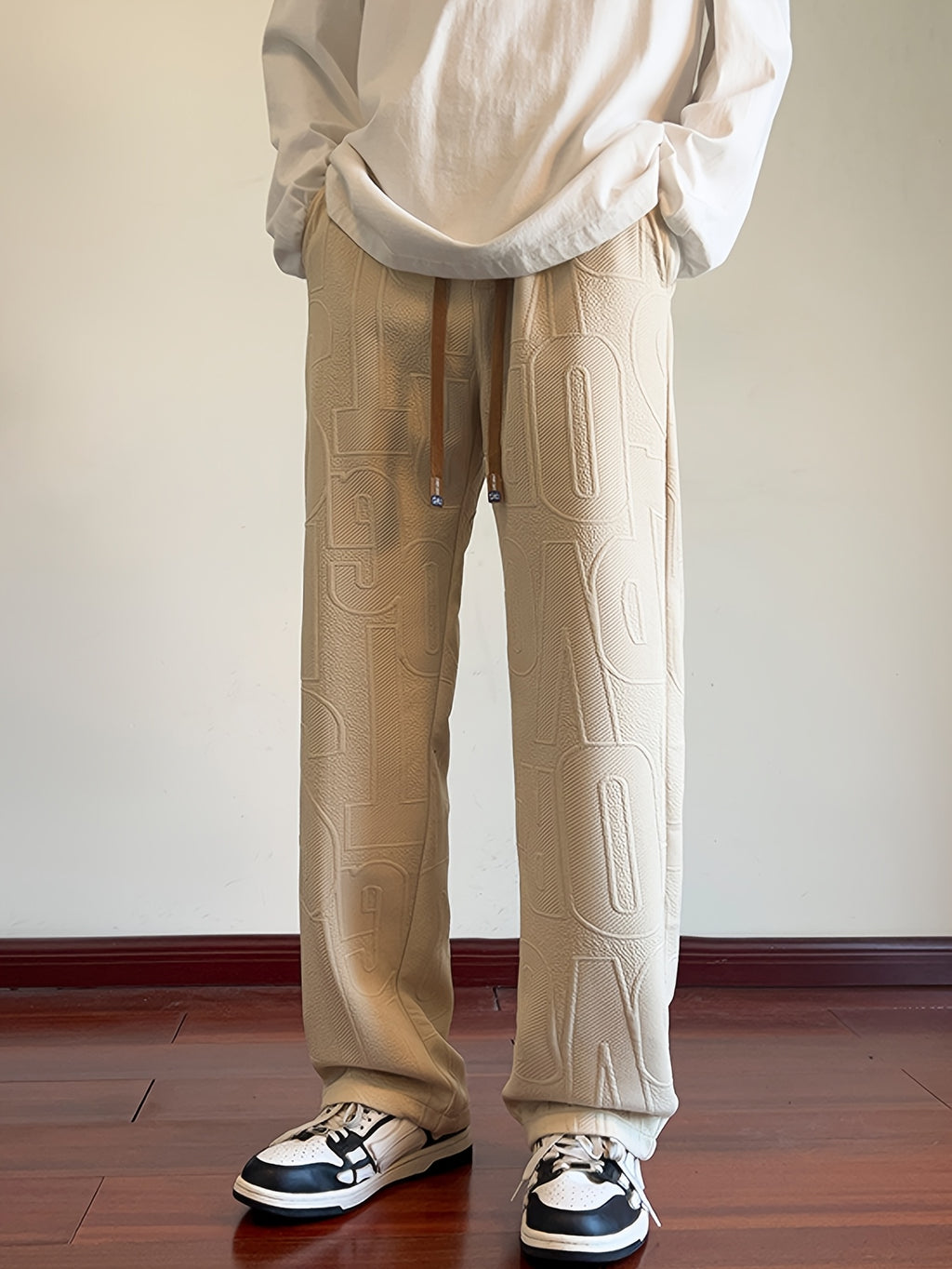 Pantalon droit d'automne pour homme, en tissu jacquard intégral, taille élastiquée avec cordon de serrage, idéal pour les activités décontractées de printemps et d'automne.