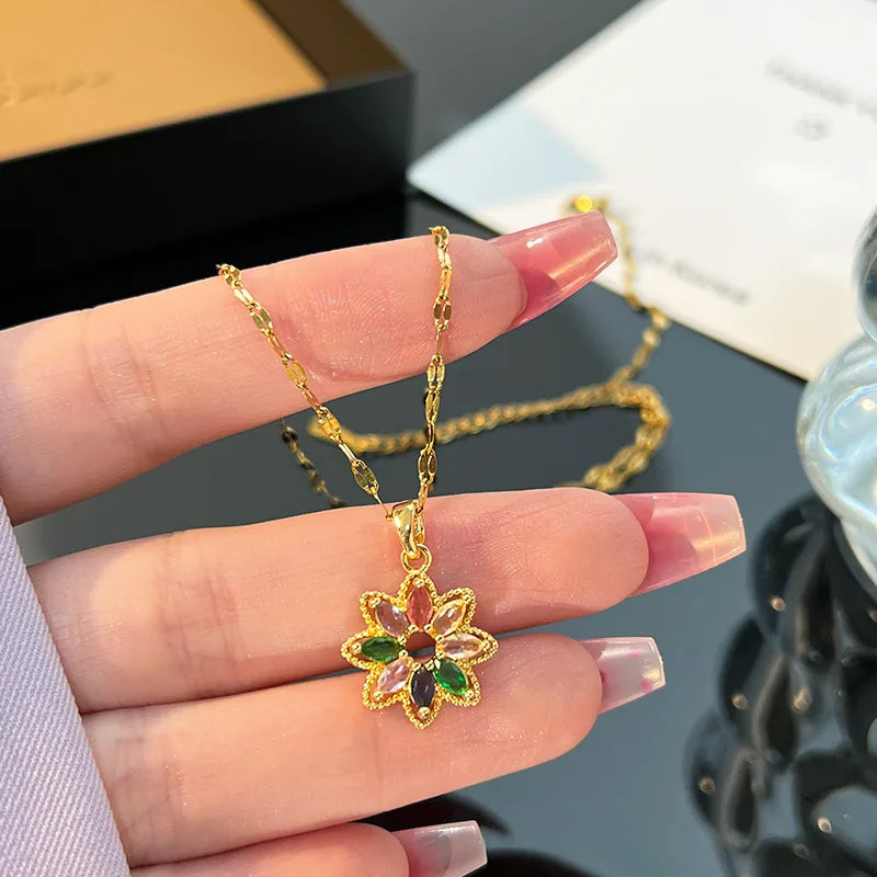 ZAKOL Nouveau Collier Pendentif Fleur Cristal Zircon Arc-en-ciel 7 Couleurs Tendance pour Femmes, Accessoires de Collier Chaîne en Acier Inoxydable