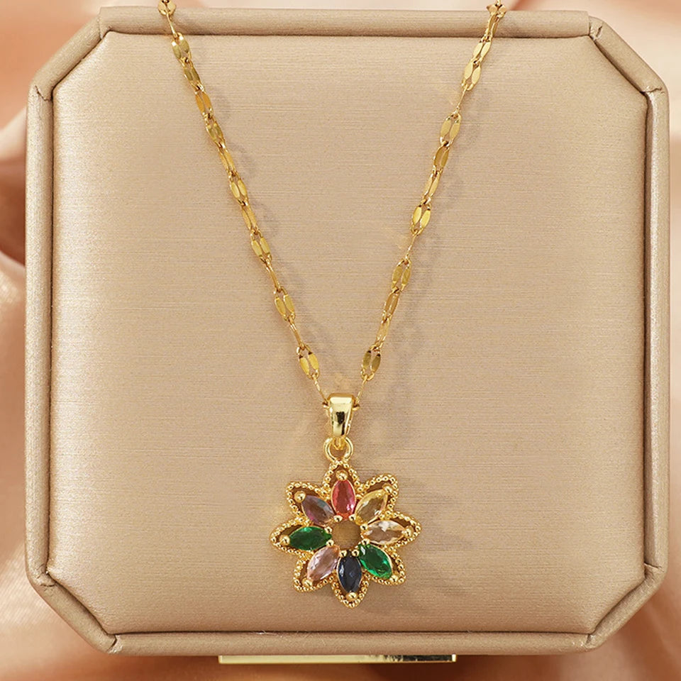 ZAKOL Nouveau Collier Pendentif Fleur Cristal Zircon Arc-en-ciel 7 Couleurs Tendance pour Femmes, Accessoires de Collier Chaîne en Acier Inoxydable