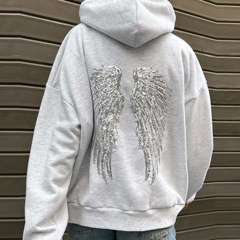 Ensemble sweat-shirt à capuche Free Wing pour femme, haut uni et pantalon long, collection 2026, style streetwear décontracté et unique.